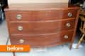 Wooden dresser with three curved drawers and brass handles, labeled "before."