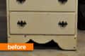 Worn cream-colored dresser with five drawers and black handles, labeled "before."