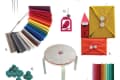 Colorful craft supplies including felt balls, scissors, fabric swatches, and vibrant envelopes with button closures.