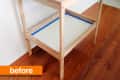 Unfinished wooden two-tier cart with white shelves and blue tape accents on a wooden floor.