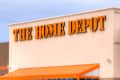The Home Depot storefront with large orange signage and an orange awning.