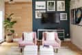 a modern living room with a statement wall