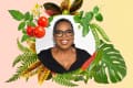 Smiling woman with glasses surrounded by tomatoes, peas, chili, and various green leaves on a gradient background.
