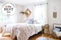Bright bedroom with a cozy knit blanket, wooden side table, and decorative wall hangings.