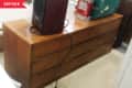 Before: Wood-tone six-drawer dresser