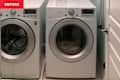 Before: Laundry room with plain blue walls