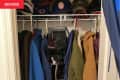 Before: crowded closet full of coats and hats