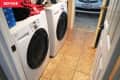 Before: Laundry room attached to garage