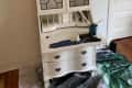 Before: vintage cabinet with glass doors on top and drawers on bottom, painted entirely white