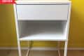 Before: Plain white IKEA nightstand on legs