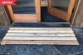 Before: Plain slatted wood doormat