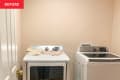 Beige laundry room before makeover
