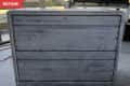 Distressed white wooden dresser with three drawers, labeled "Before."