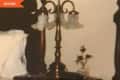 Before: Antique lamp on nightstand