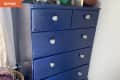 Before: Blue dresser with silver knobs