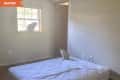 Before: Bedroom with window and mattress on floor