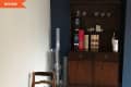 Before: China cabinet in indented corner in room
