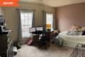 Before: a crowded bedroom with pink and tan walls