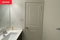 Before: Plain builder-grade bathroom