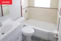 White bathroom before renovations.