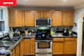 Kitchen with dated oak cabinets