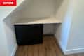 White countertop in nook before installing home bar.
