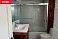 Dated bathroom before renovation.