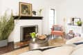 a black and white mantel that displays only a framed piece of art