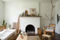 White brick fireplace with candles
