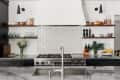 Modern kitchen with marble countertops, gas stove, white tile backsplash, open shelves, and stainless steel sink.