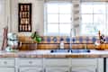 country kitchen with brown and blue glazed tiles
