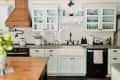 Large kitchen with white cabinets