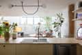 Wooden countertop with white sink.