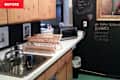 Colorful, multi-patterned kitchen before, during, and after renovation/redecoration.
