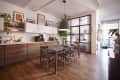 Marble top dining room table in kitchen.