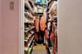 Shoes and clothes in closet.