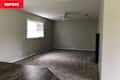 Living room with gray walls and gray carpet