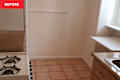 Terra Cotta floor tiles in kitchen before renovation.