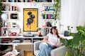 woman sitting in chair in her living room