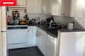 white kitchen with white cabinets before makeover