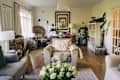 Styled rental bungalow living room with big black and white art