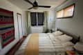 Blackout shades in cool bedroom.