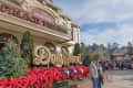 Showstreet Palace Theater entrance at Dollywood with festive decorations and visitors walking nearby.