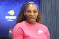 Tennis player in a pink Nike shirt at the US Open press event.