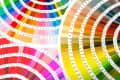Color swatches arranged in circular patterns, displaying a wide range of hues from red to green.