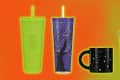 Four colorful Starbucks drinkware items: a bright green tumbler, a purple tumbler with a tree design, a black mug with stars, and a light blue cup with a pattern.