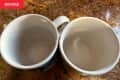 Stained coffee mugs before cleaning.