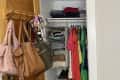 Organized small closet.