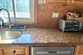 Cleared kitchen countertop.