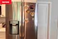 Front of stainless steel refrigerator before adding magnetic dryer sheet holder.